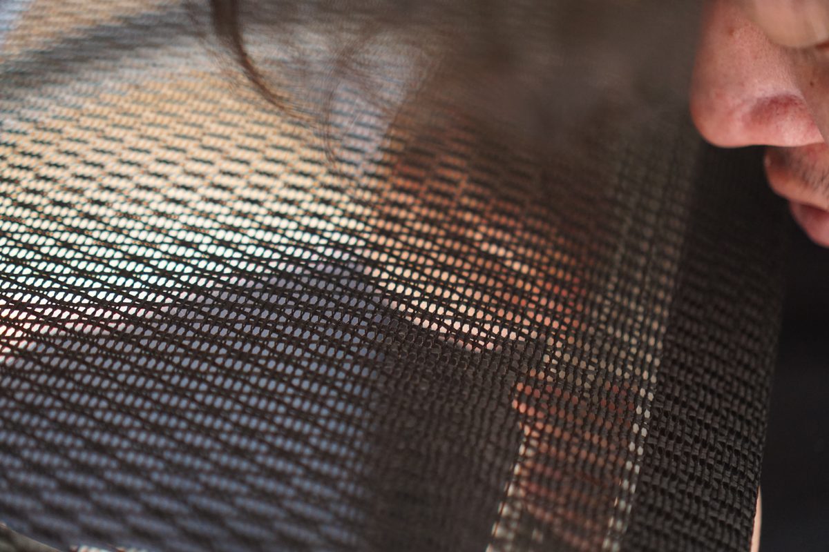 Close view of the Eurotech iOO mesh weave with light passing through it