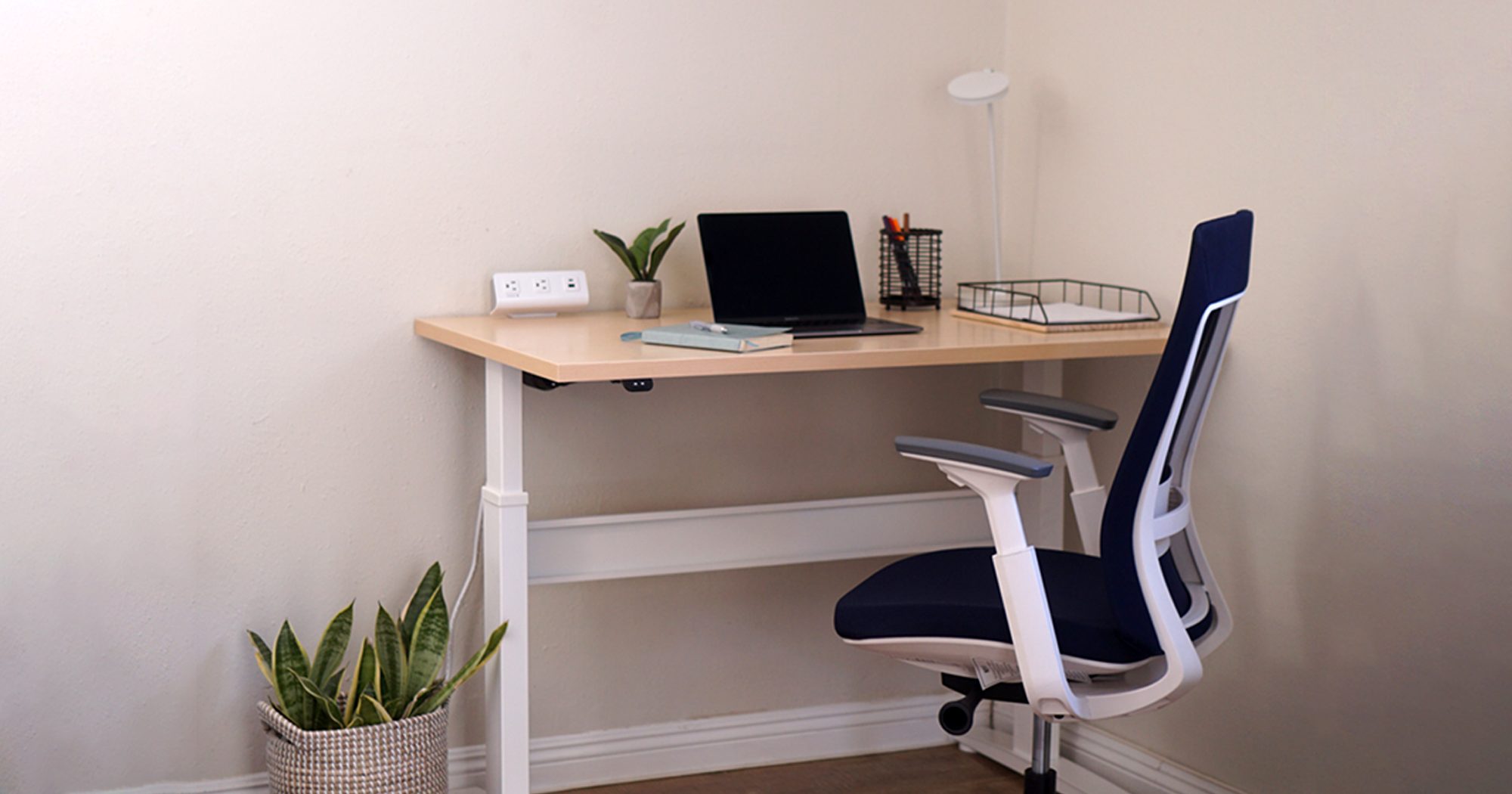 A RightAngle Bonita standing desk and a Eurotech Elevate chair in the corner of our den